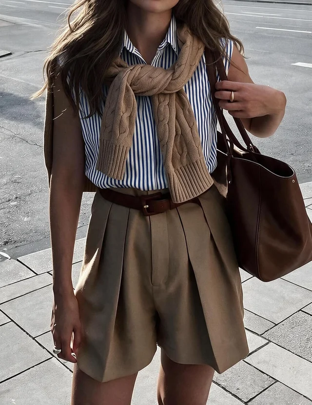 Sleeveless collared button-down blouse — view 1